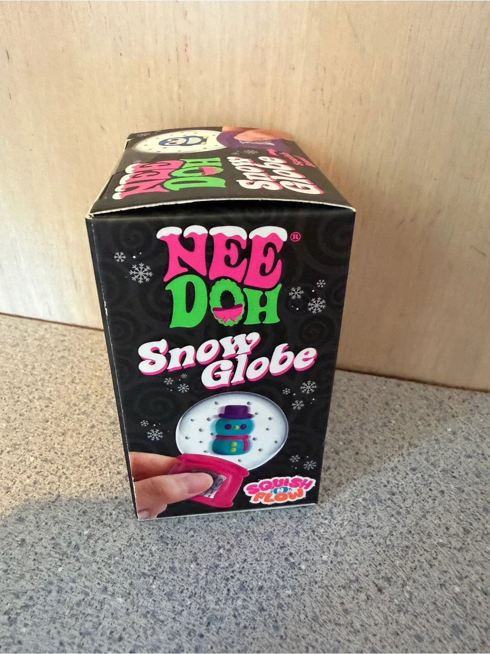 NeeDoh Pink Snow Globe Squishy Toy with Teal Snowman